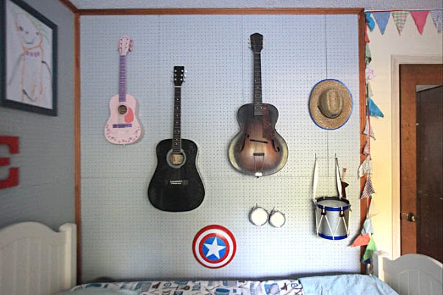 Pegboard Display Wall in a Kids' Shared Bedroom