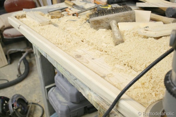 building out stair with wood bullnose and house numbers under barn door (6)