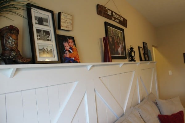 decorated barn door wainscoting ledge faux mantel