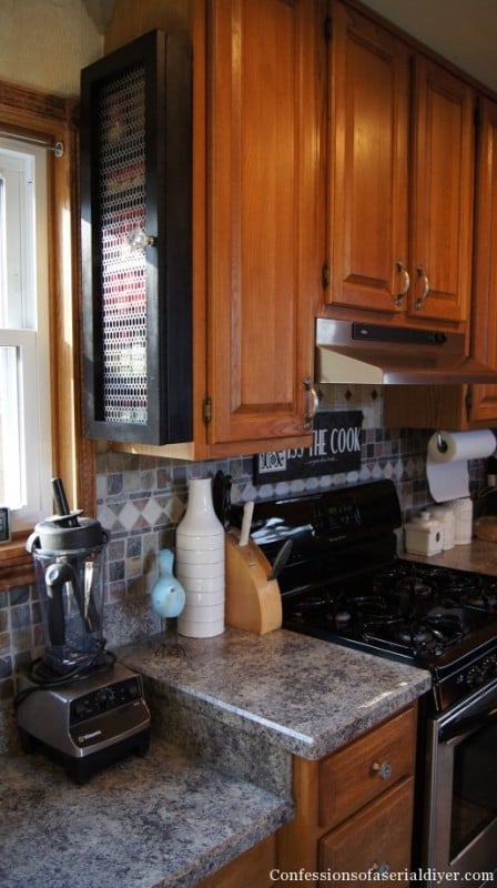 Save space with a DIY spice cabinet on the side of the kitchen cabinet | Confessions of a Serial DIYer on Remodelaholic.com