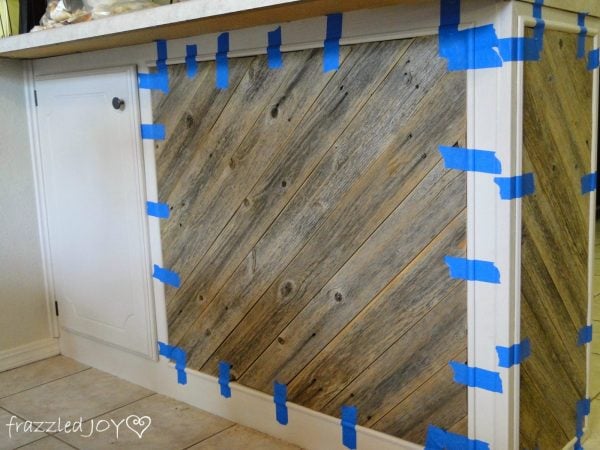 adding trim to reclaimed wood plank kitchen island, Frazzled Joy on Remodelaholic