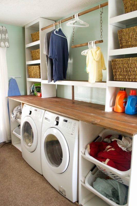 Built-in Laundry Unit with Shelving, Seesaws and Sawhorses on Remodelaholic.com