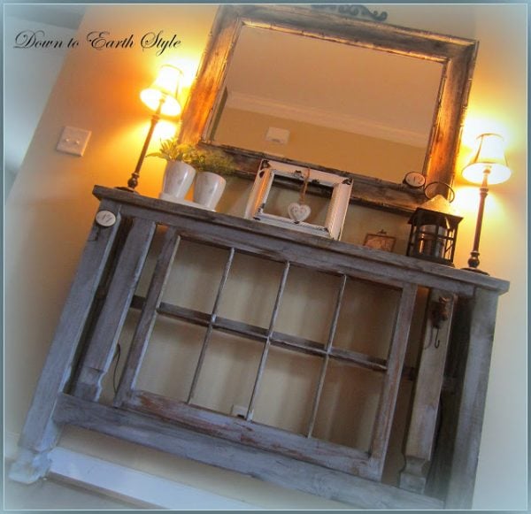 Down to Earth Style - old window in a foyer table console - via Remodelaholic