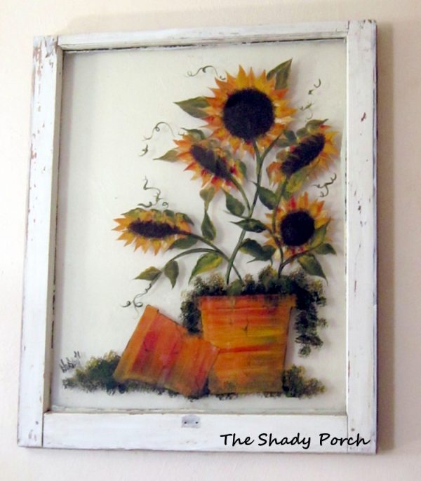 The Shady Porch - paint on an old window like a canvas via Remodelaholic