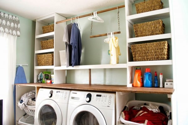 built-in laundry unit with storage baskets, Seesaws and Sawhorses on Remodelaholic