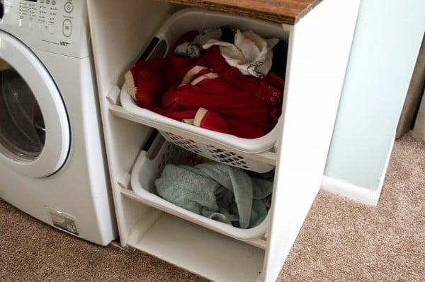 laundry baskets in washer and dryer unit, Seesaws and Sawhorses on Remodelaholic