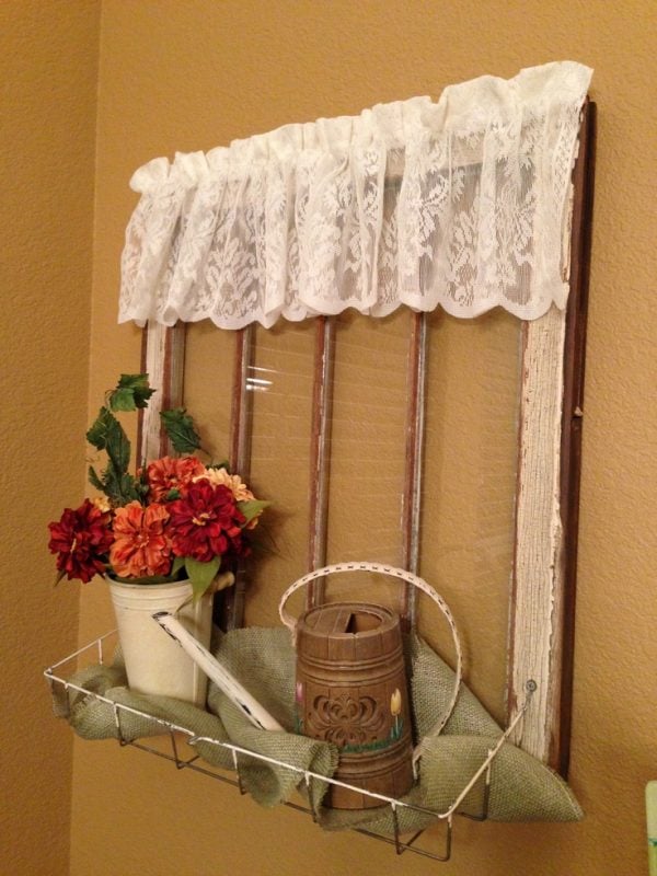 source unknown - add a wire basket to an old window to use as an organizer - via Remodelaholic
